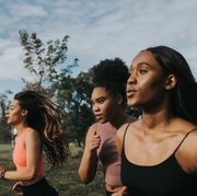 determined woman joggers, how to breathe while running